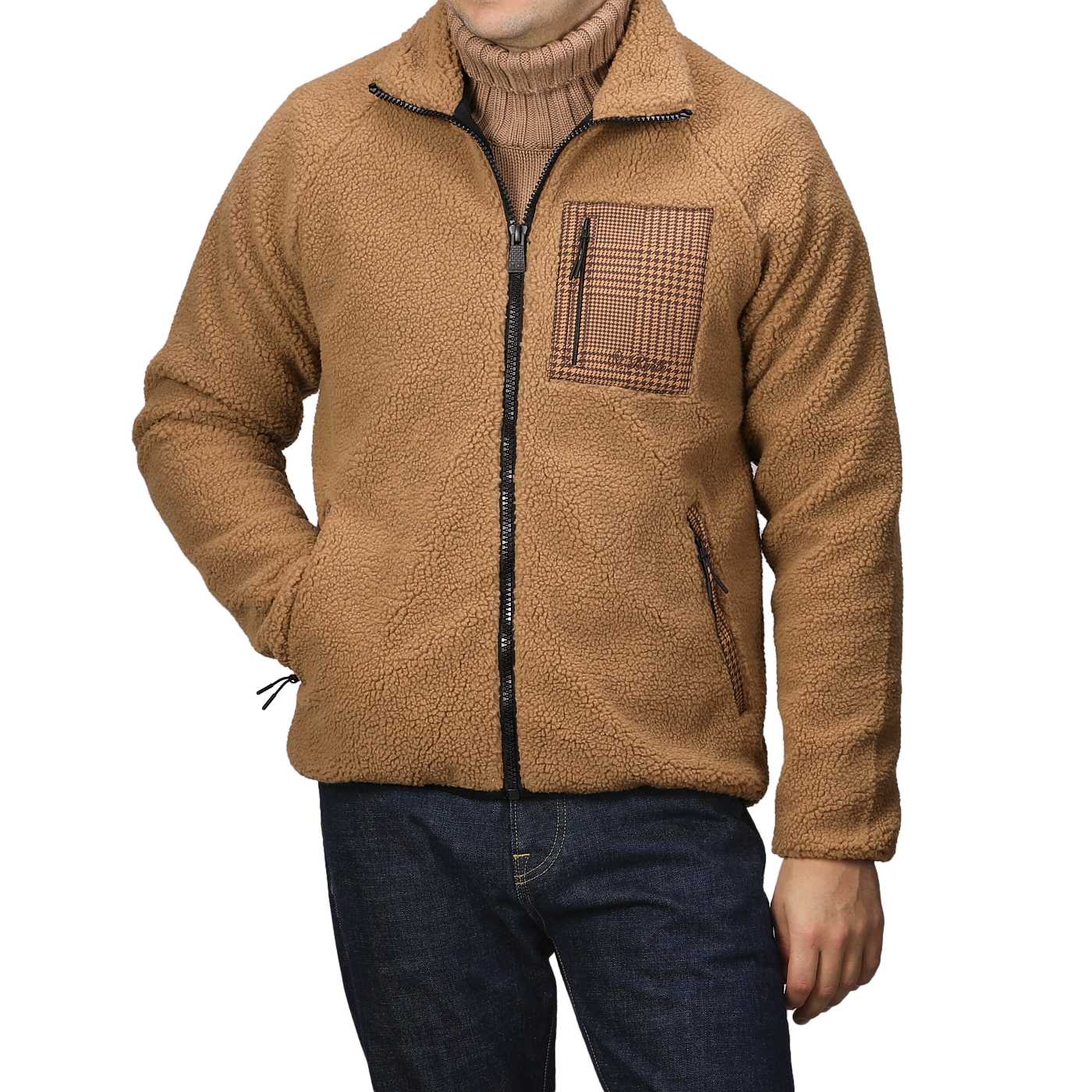 A person wearing an MC2 Saint Barth Camel Beige Sherpa Fleece Jacket with houndstooth details and blue jeans.