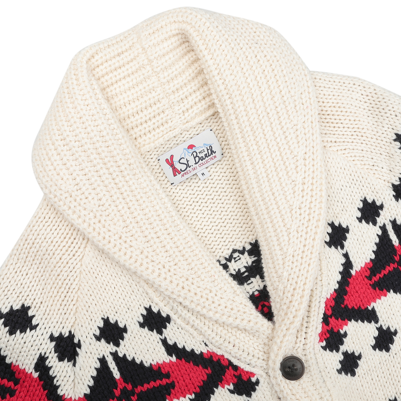 Detailed view of the MC2 Saint Barth Cream White Wool Nordic Aztec Cardigan, crafted from a soft wool-blend. This cream knitted sweater displays black and red geometric patterns, with a unique shawl collar and a single black button.