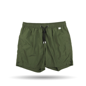 The MC2 Saint Barth Military Green Pantone 18-0316 Swim Shorts are designed with a contrasting drawstring waist and an elastic waistband, made from quick-drying fabric for ultimate comfort.