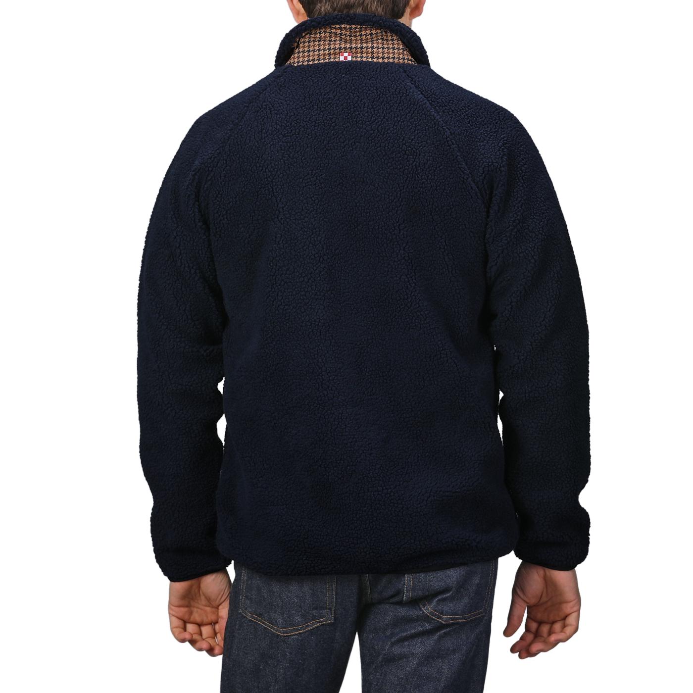 Rear view of a person in a regular fit, Navy Blue Sherpa Fleece Jacket by MC2 Saint Barth layered over a collared shirt, paired with dark jeans.