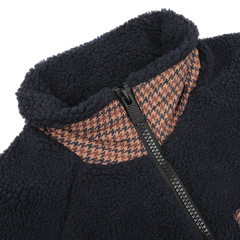 A detailed view of the MC2 Saint Barth Navy Blue Sherpa Fleece Jacket showcases its front zip-up design. The regular fit is highlighted by a unique collar featuring a camel beige and black houndstooth pattern.