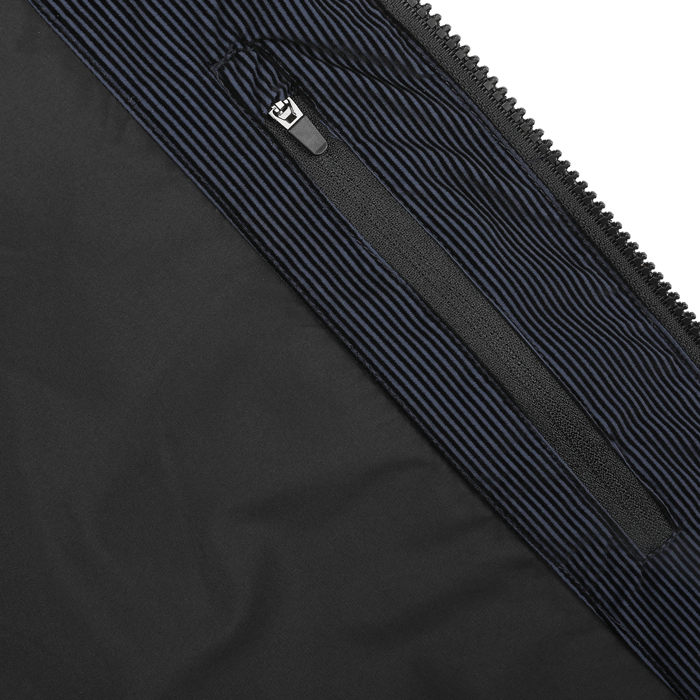 Close-up of a black fabric with a vertical zipper pocket against a navy and black striped background, reminiscent of the MC2 Saint Barth Navy Blue Technical Padded Maier Jacket featuring recycled filling.