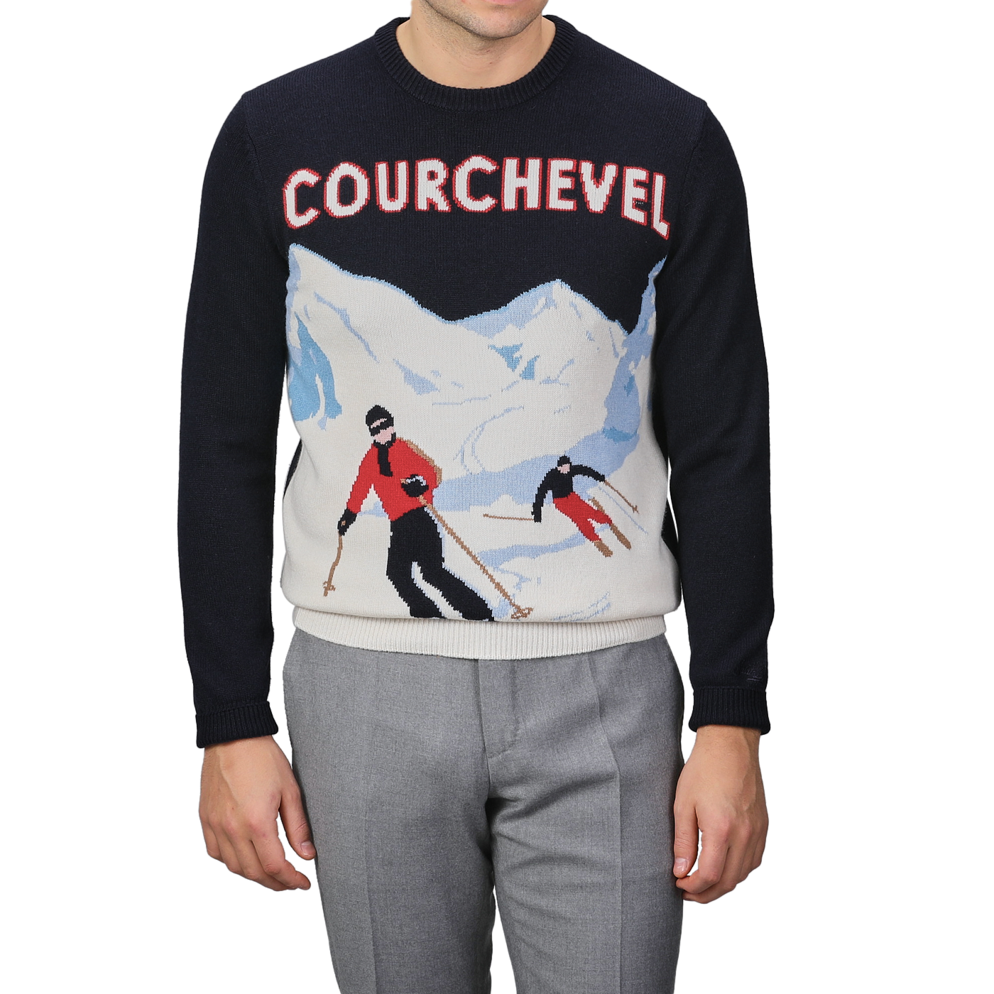 Someone is seen wearing the Navy Blue Wool Cashmere Courchevel Sweater from MC2 Saint Barth, showcasing a vibrant skiing scene and prominently featuring "Courchevel," in honor of one of the most famous ski resorts.