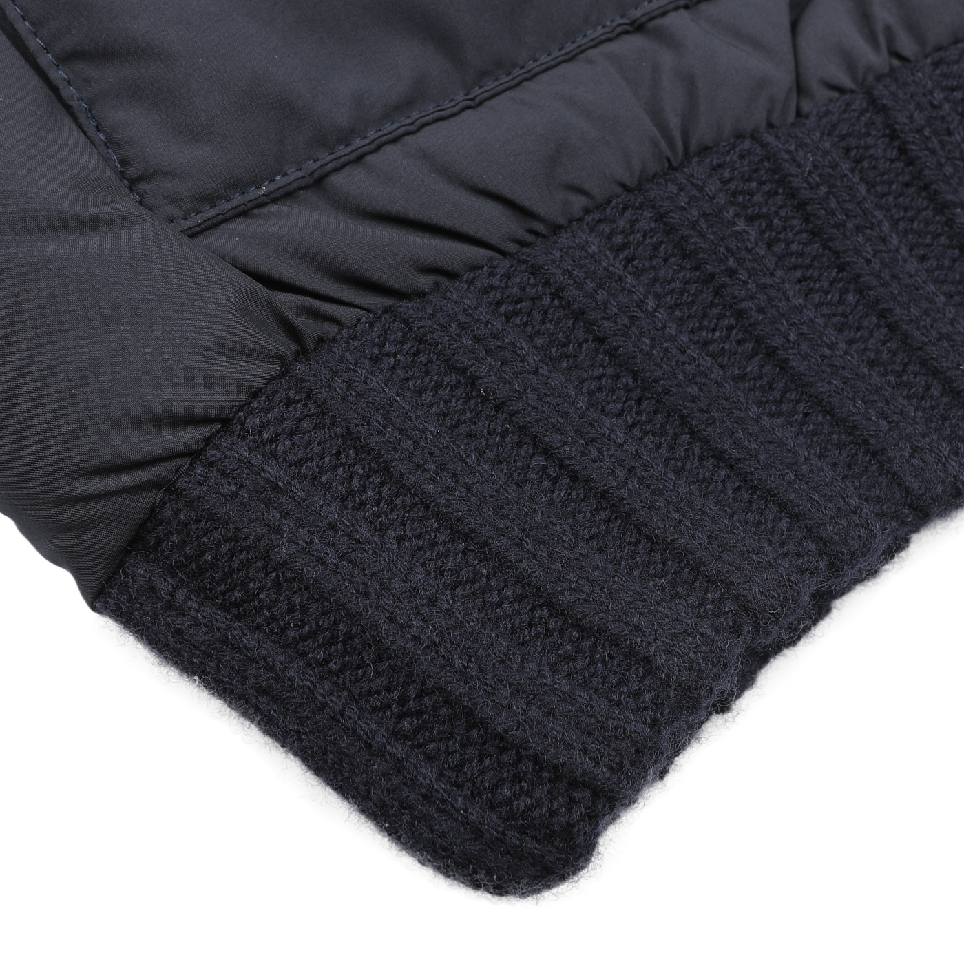 A close-up of the navy blue knit cuff attached to the sleeve of the MC2 Saint Barth Wool Whistler Padded Jacket, highlighting its intricate texture and stitching details.