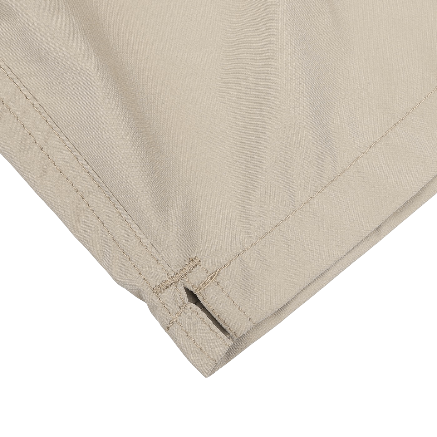 Close-up of the hem of MC2 Saint Barth's Safari Beige Pantone 15-1116 Swim Shorts, highlighting the detailed stitching and bottom edge slit.