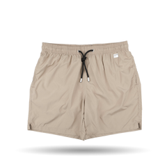 The Safari Beige Pantone 15-1116 Swim Shorts by MC2 Saint Barth are crafted from quick-drying fabric and feature an elastic waistband with side pockets, showcased against a white background.