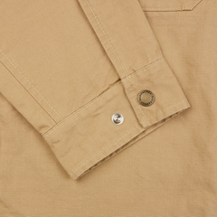 A close up of a Camel Beige Cotton Ripstop Country Overshirt from Manifattura Ceccarelli with buttons.