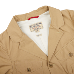 A men's Camel Beige Ripstop Cotton Bush Jacket with a red Manifattura Ceccarelli label made in Italy.