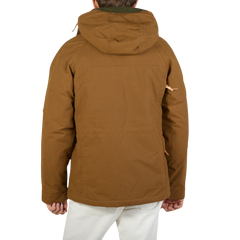 The back view of a man wearing a Manifattura Ceccarelli Dark Tan Cotton Canvas Fisherman Parka.