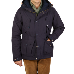 The man is wearing a Navy Blue Cotton Canvas Fisherman Parka made by Manifattura Ceccarelli.