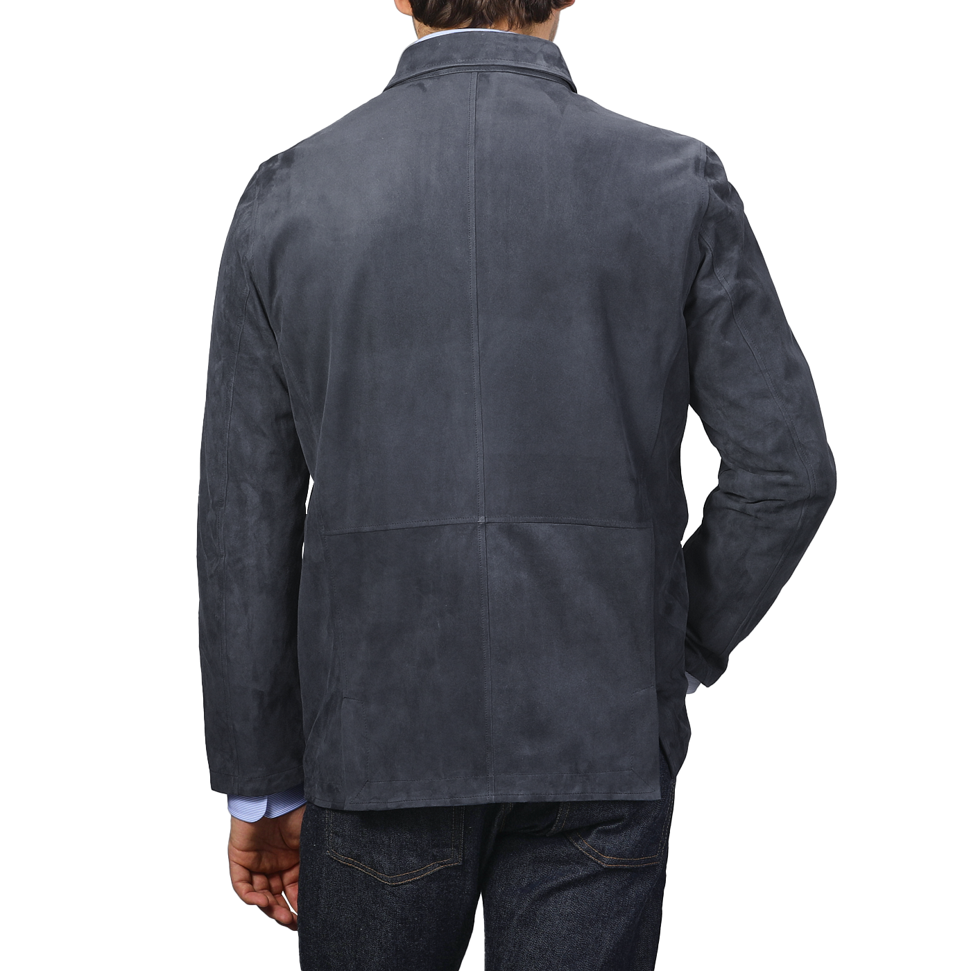 Back view of a person wearing the Denim Blue Suede Unlined Jacket by Manto and blue jeans against a plain background.