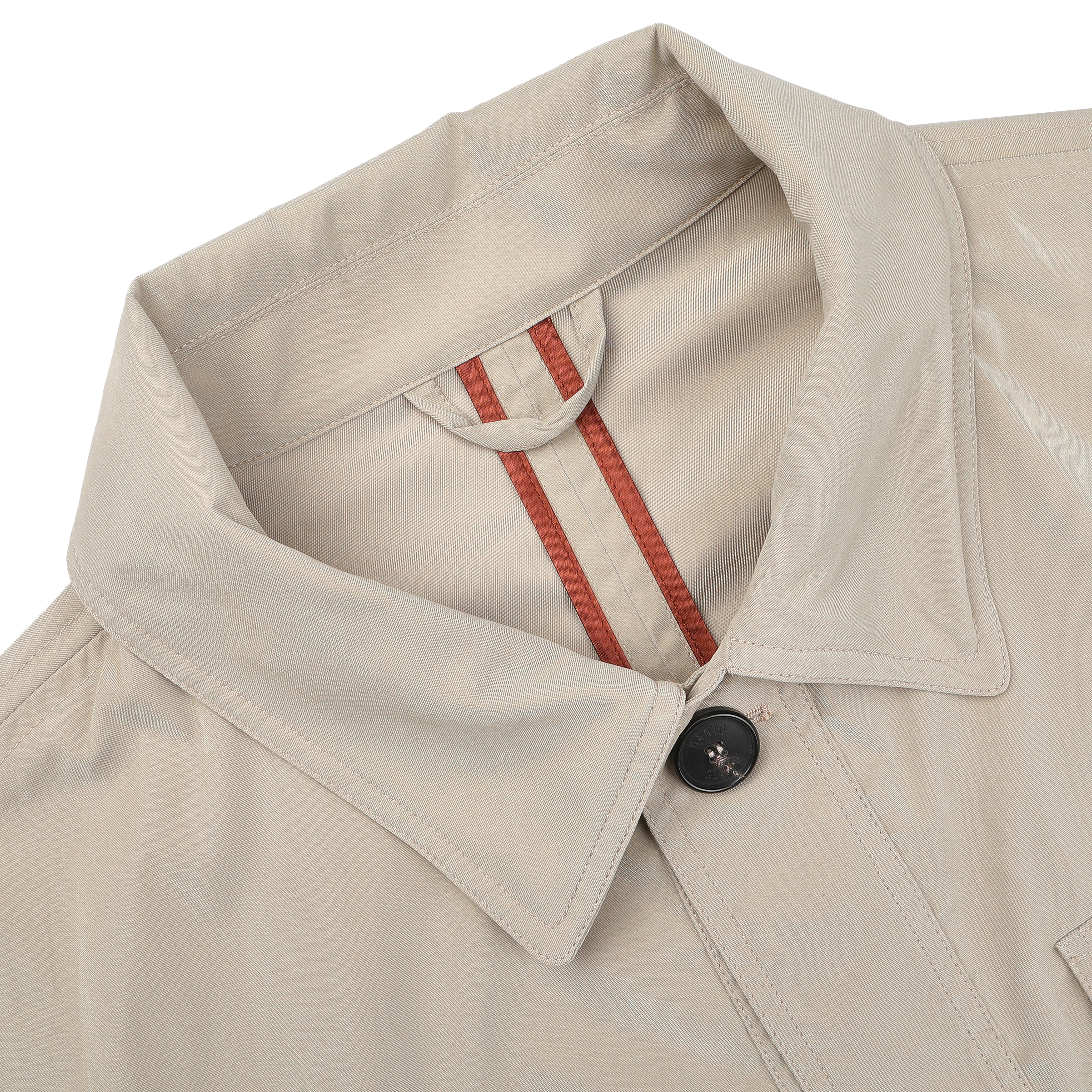 Close-up of Manto's Khaki Beige Ultrafine Microfibre Safari Jacket, a slim-fit with a dark button and red-striped inner tab detail.