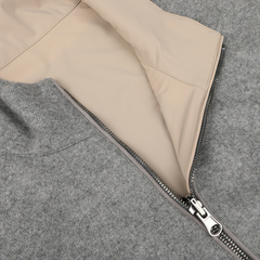 Detailed close-up of an unzipped Manto Grey Beige Cashmere Nylon Reversible Gilet, showcasing its luxurious silver zipper and revealing the elegant beige inner lining.