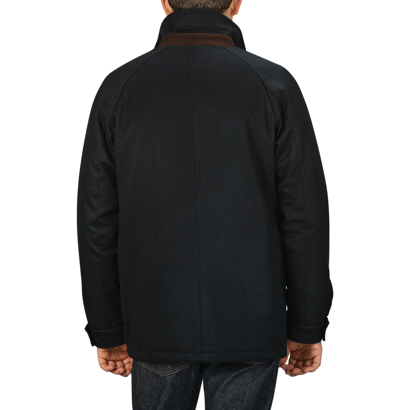 A person wearing a Navy Blue Cashmere Car Coat by Manto and jeans is standing with their back facing the camera against a plain gray background.