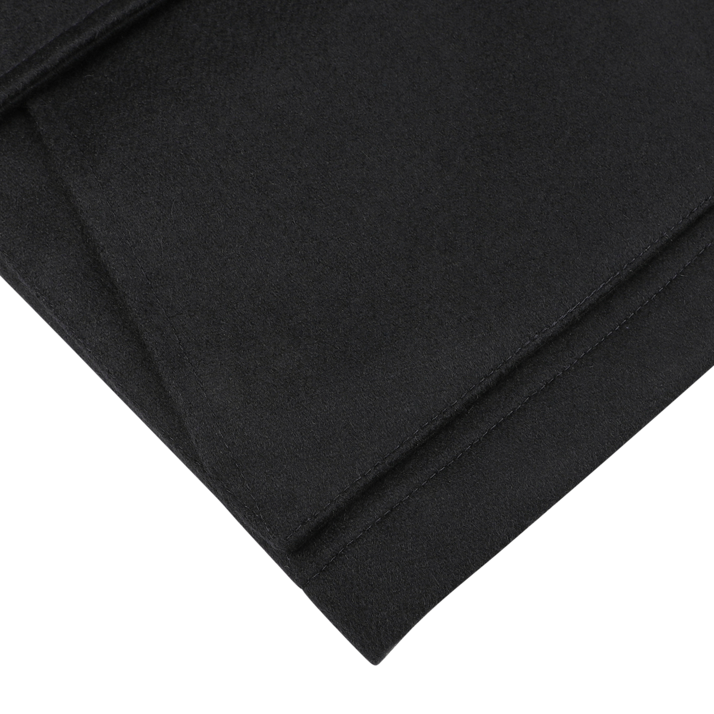 A close-up of neatly folded navy blue cashmere outer fabric with clean edges against a white background, showcasing the Manto Navy Blue Cashmere Car Coat.