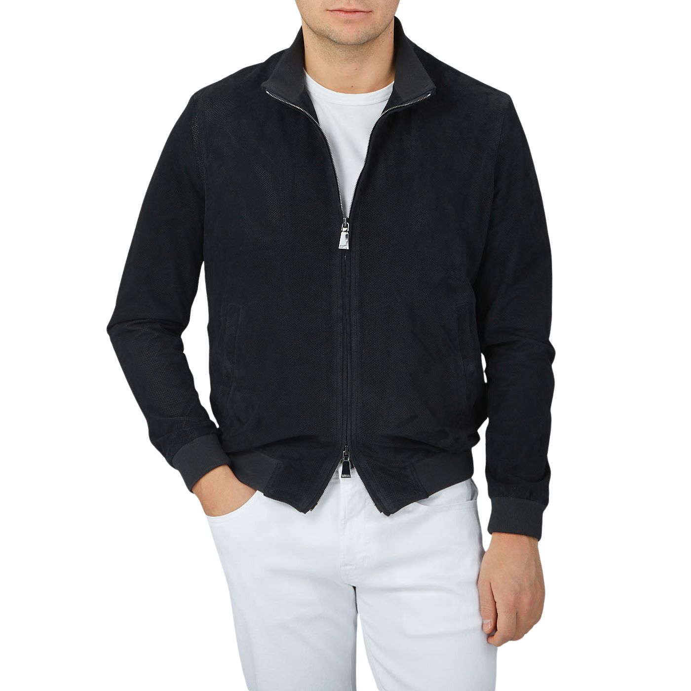 A man wearing a luxurious Manto Navy Blue Perforated Suede Leather Blouson jacket and white pants.
