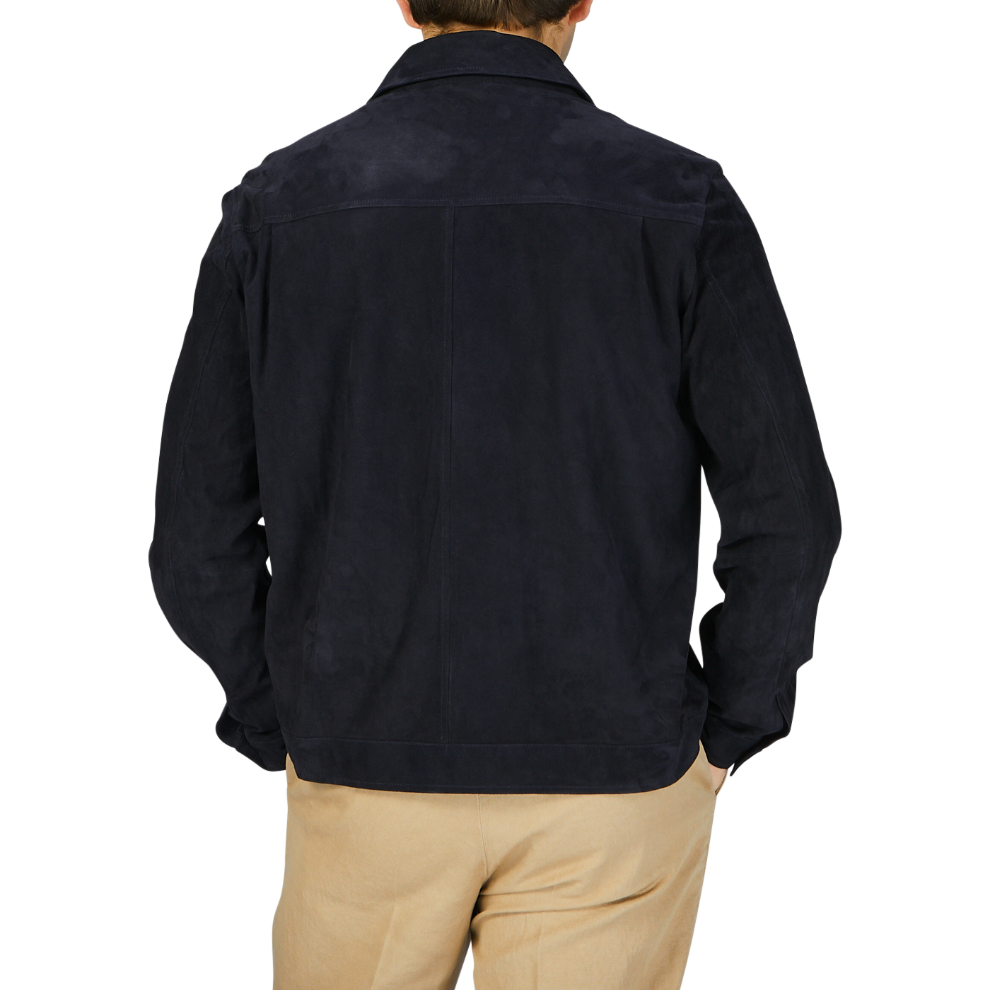 The back view of a man wearing a Manto Navy Blue Suede Leather Overshirt and tan pants.