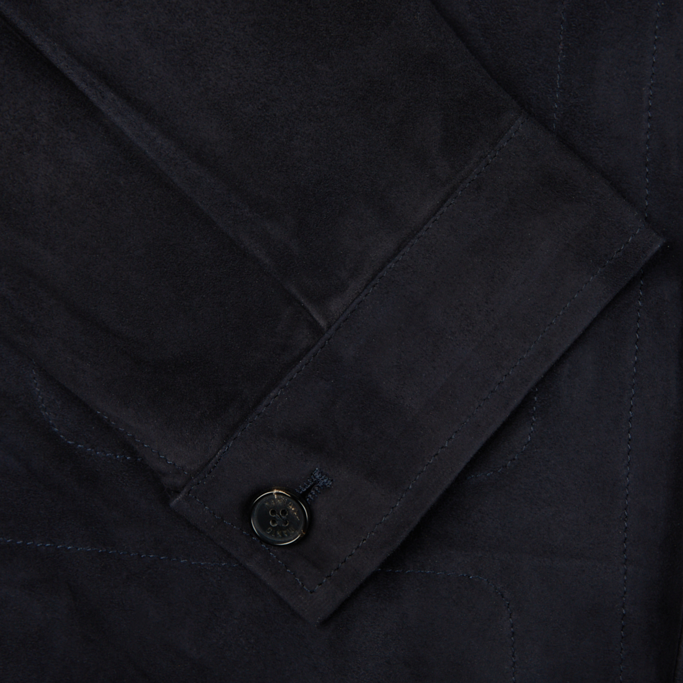 A close up image of a Manto Navy Blue Suede Leather Overshirt.
