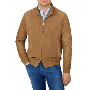 A man wearing a Manto Tobacco Brown Perforated Suede Leather Blouson.