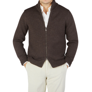 A man in a Dark Brown Heavy Wool Maxim Zip Jacket made by Massimo Alba and white pants.