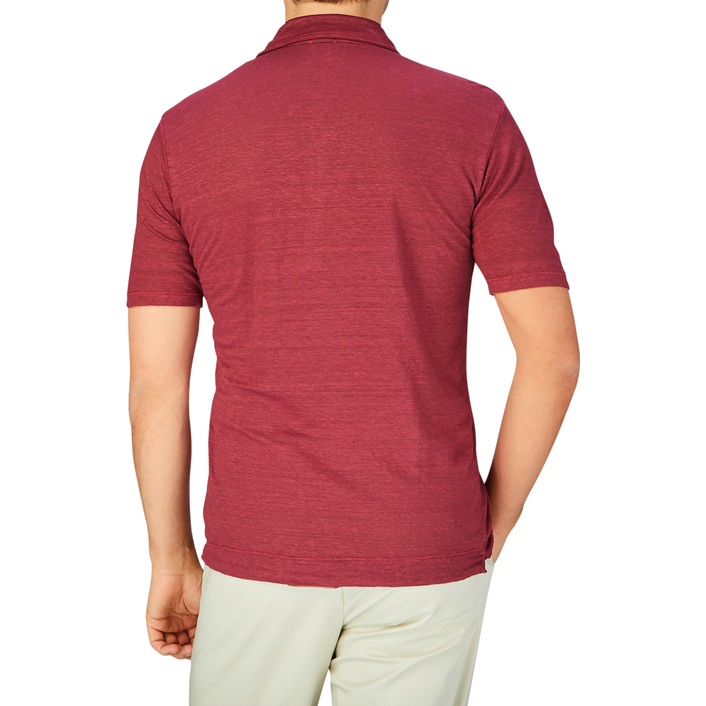 A man viewed from behind, wearing a Massimo Alba Raspberry Red Linen Polo Shirt and light-colored pants.