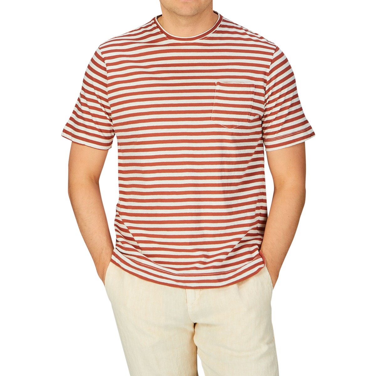 Man wearing a Massimo Alba Rust Brown Striped Cotton Linen T-Shirt with beige pants.