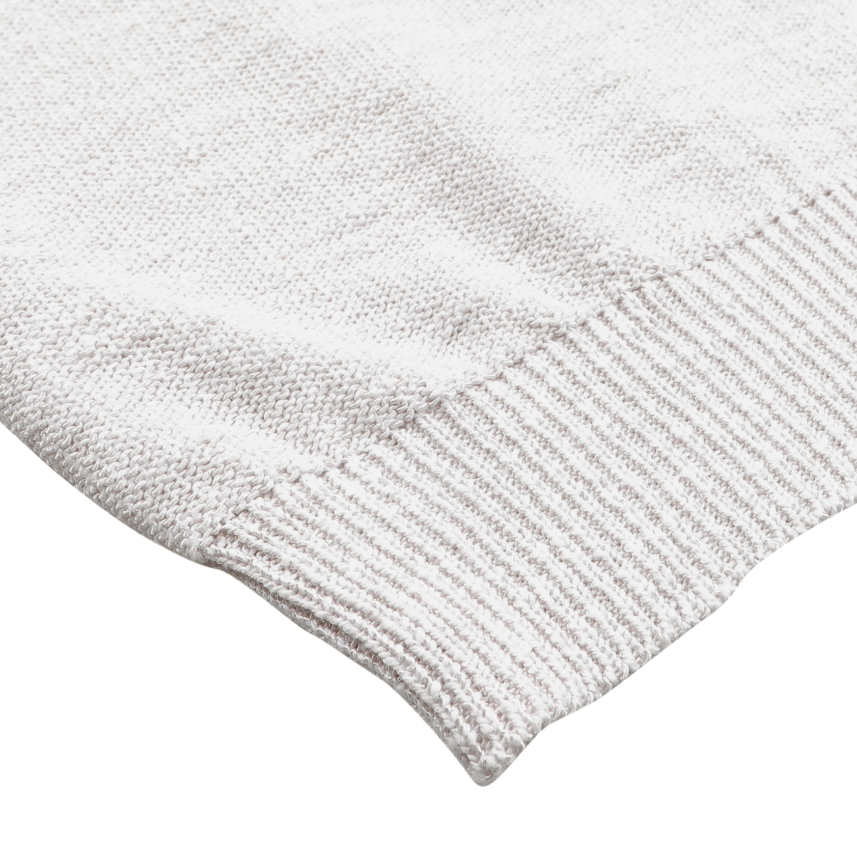 Close-up of the Cream Summer Mouline Crew Neck Sweater by Maurizio Baldassari, showcasing its white knitted fabric edge with ribbed detailing on a flat surface and highlighting the texture typical of a summer mouline knit.