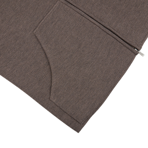 A Maurizio Baldassari Dark Beige Milano Stitch Wool Zip Gilet with a pocket on it.