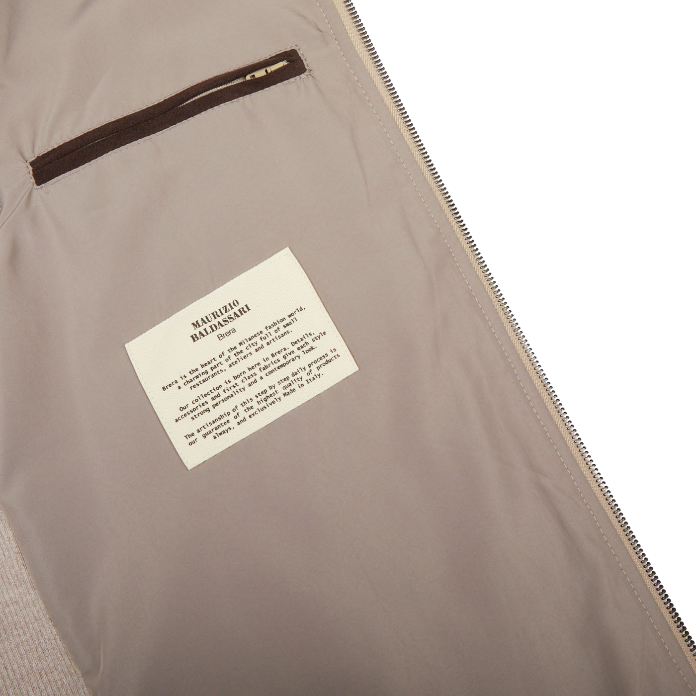 A Maurizio Baldassari Beige Water Repellent Pure Cashmere Gilet with label attached.