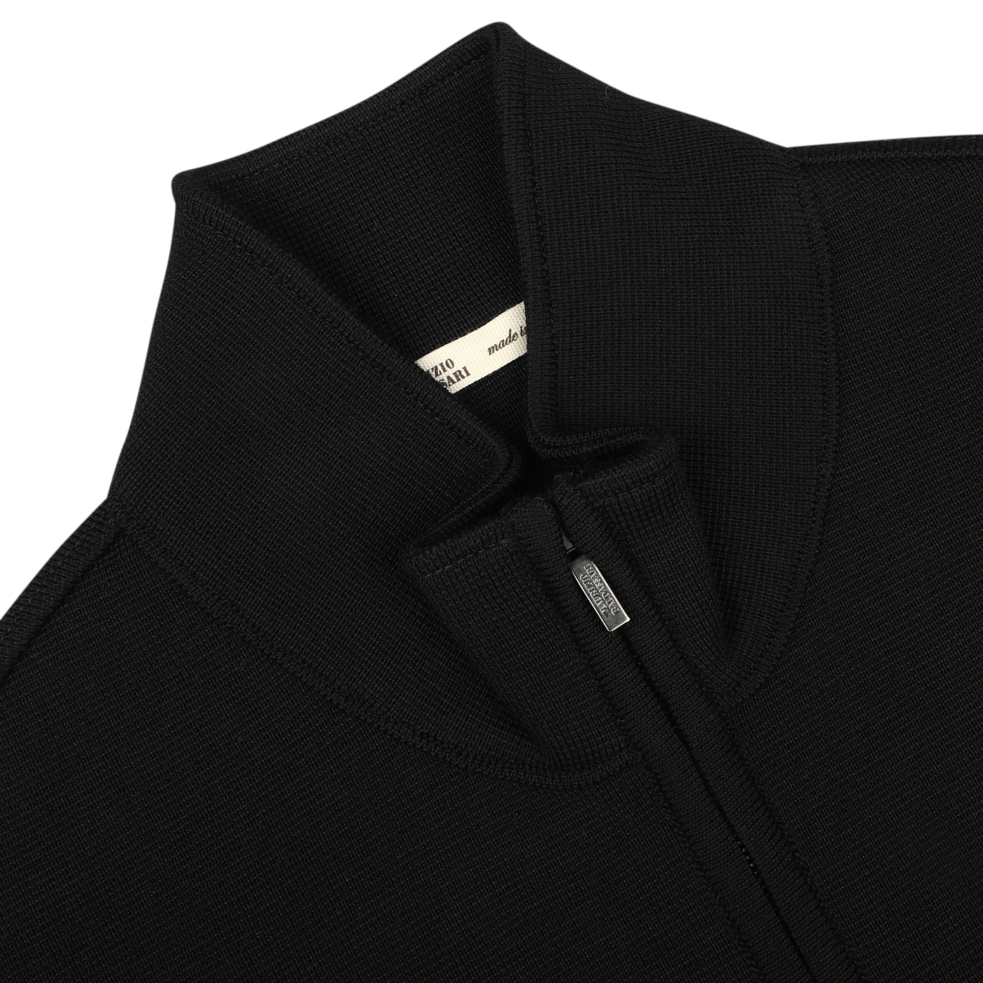 Close-up of the Black Milano Stitch Wool Zip Gilet by Maurizio Baldassari, featuring a high collar, a small manufacturer label near the collar, and crafted from virgin wool using Milano stitch.