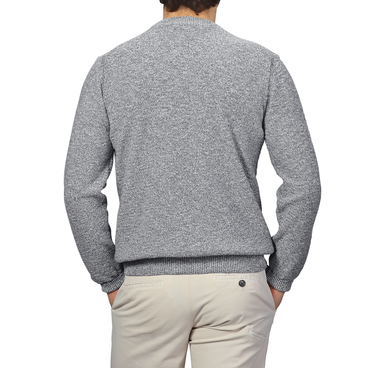 A person stands with their back to the camera, wearing a Blue Melange Summer Mouline Crew Neck Sweater and beige pants by Maurizio Baldassari.