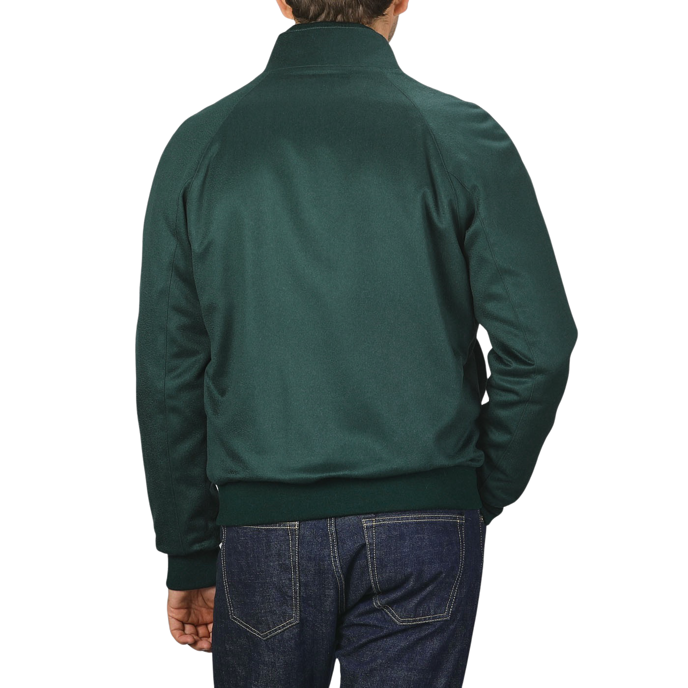 A person is shown from the back wearing a Maurizio Baldassari Bottle Green Cashmere Zip Blouson and blue jeans against a plain background.