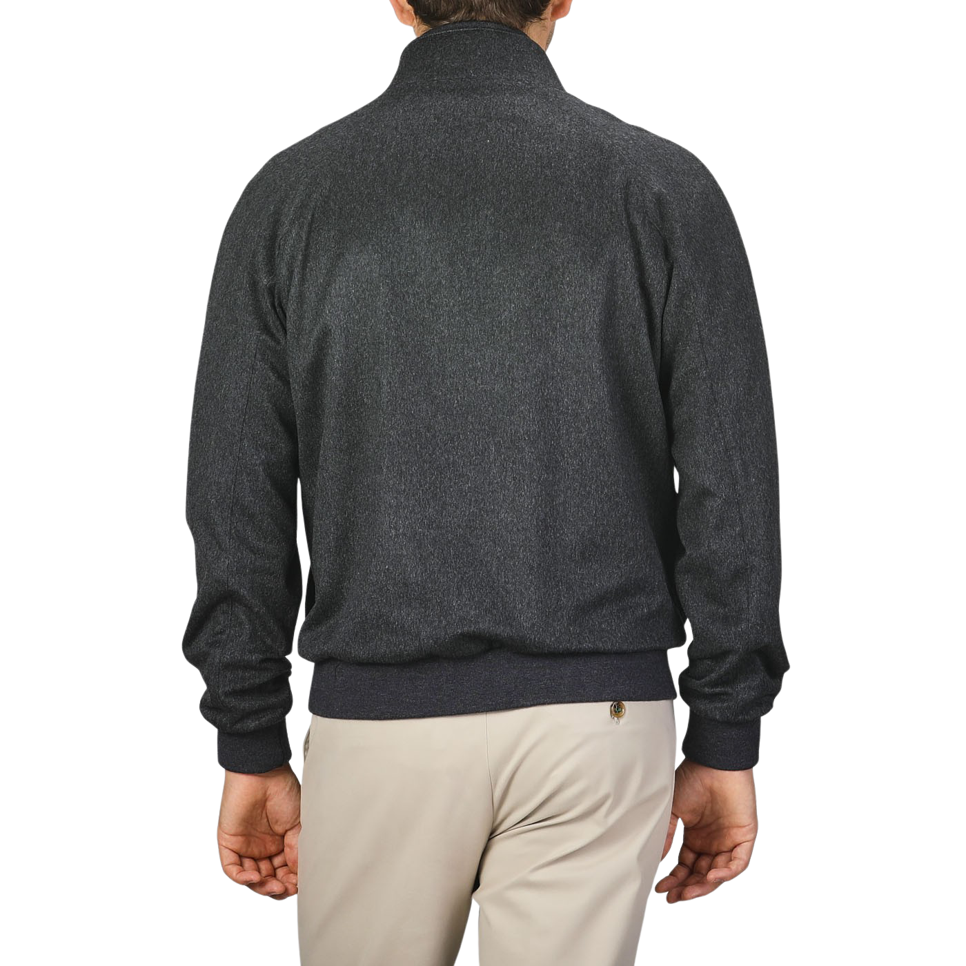 A person wearing a Charcoal Grey Cashmere Zip Blouson by Maurizio Baldassari and light-colored pants is shown from the back against a plain background.