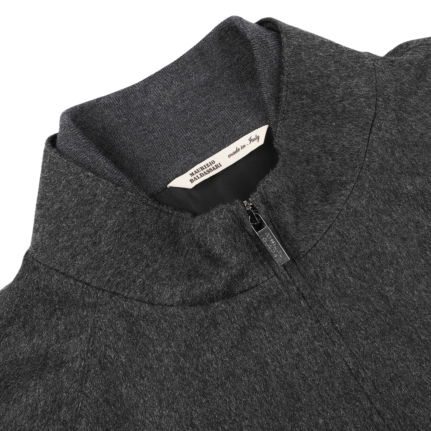 Close-up of the charcoal grey zip blouson collar, featuring a visible brand label inside that reads "Maurizio Baldassari Made in Italy.