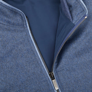 A close up of a Maurizio Baldassari Cloud Blue Water Repellent Pure Cashmere Gilet zippered jacket.