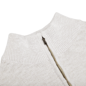 A close up of a Maurizio Baldassari Cream White Cotton Mouline 1/4 Zip Sweater.