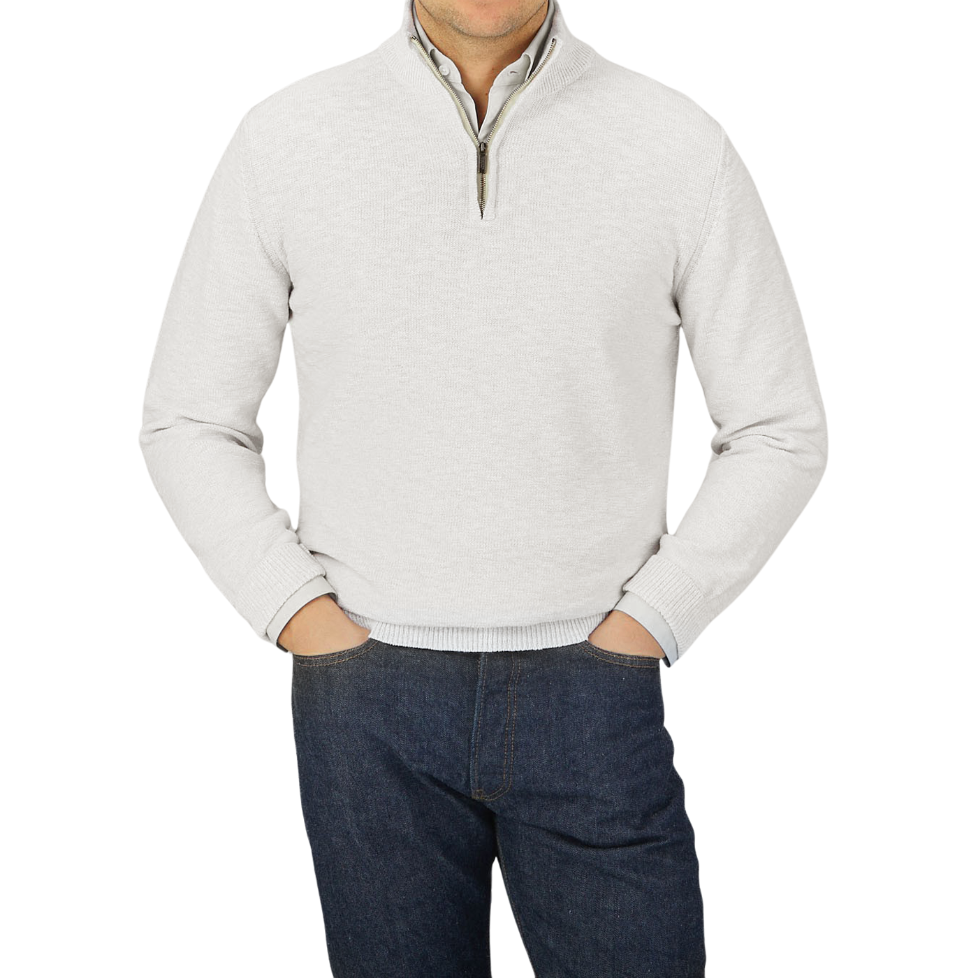 A man wearing a Maurizio Baldassari Cream White Cotton Mouline 1/4 Zip Sweater and jeans.