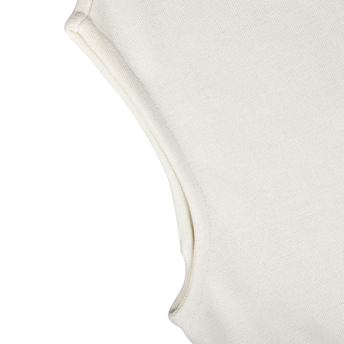 Close-up of the armhole and shoulder seam of the Cream Milano Stitch Wool Zip Gilet by Maurizio Baldassari, a sleeveless off-white textured fabric garment crafted using Milano stitch techniques, against a light gray background.