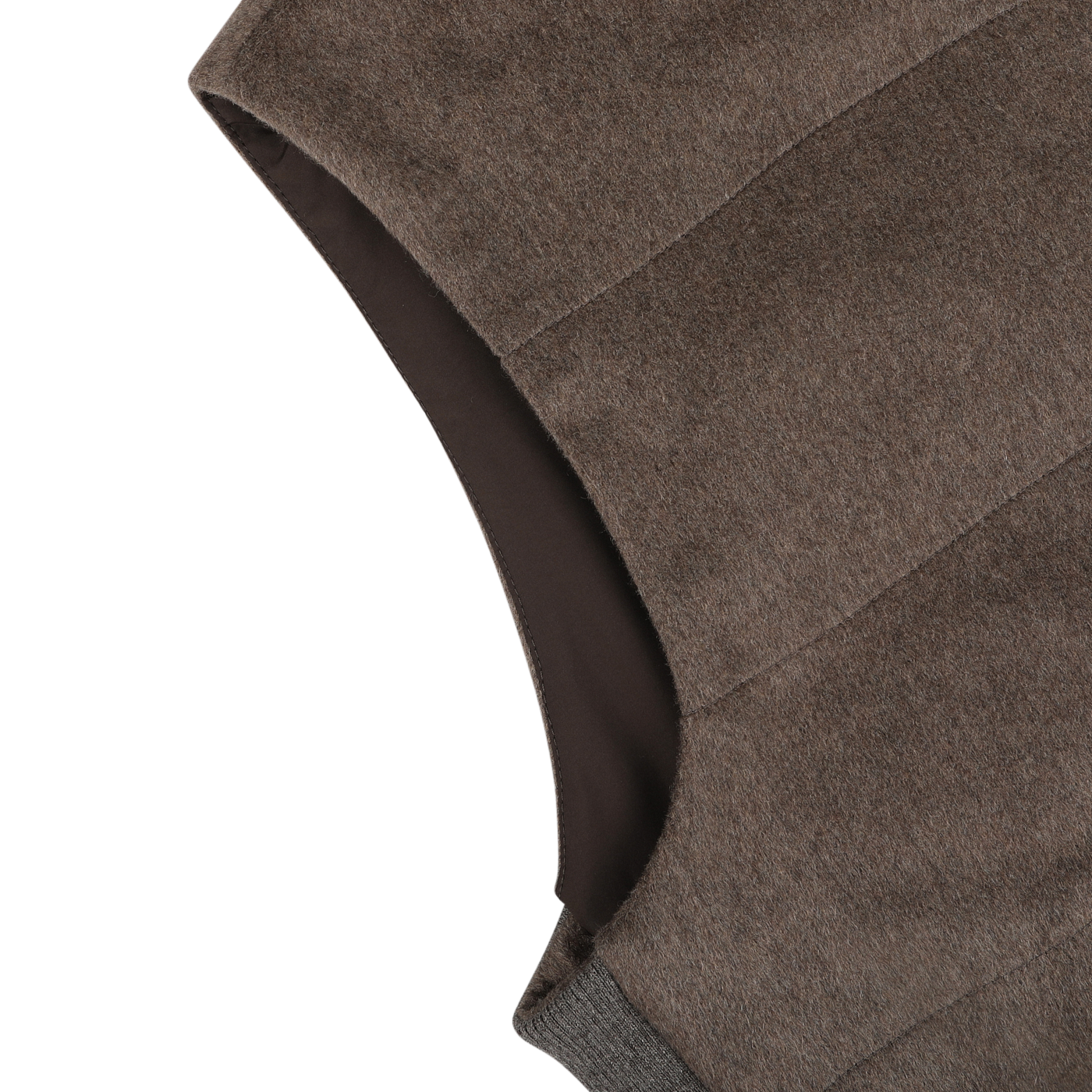 Close-up of the armhole and shoulder of the Dark Taupe Water Repellent Cashmere Gilet by Maurizio Baldassari on a light background.