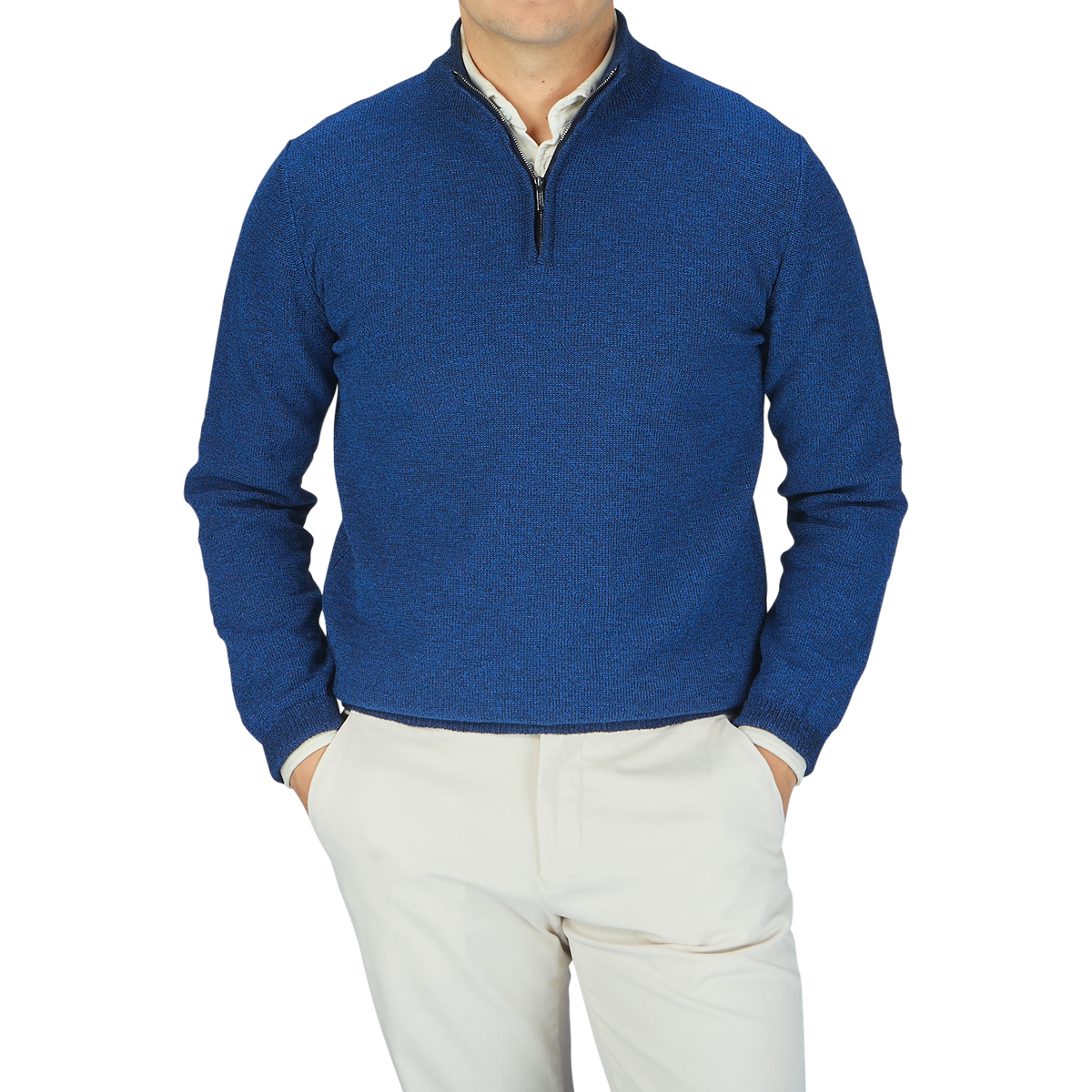A man wearing a Maurizio Baldassari Denim Blue Cotton Mouline 1/4 Zip Sweater and khaki pants.