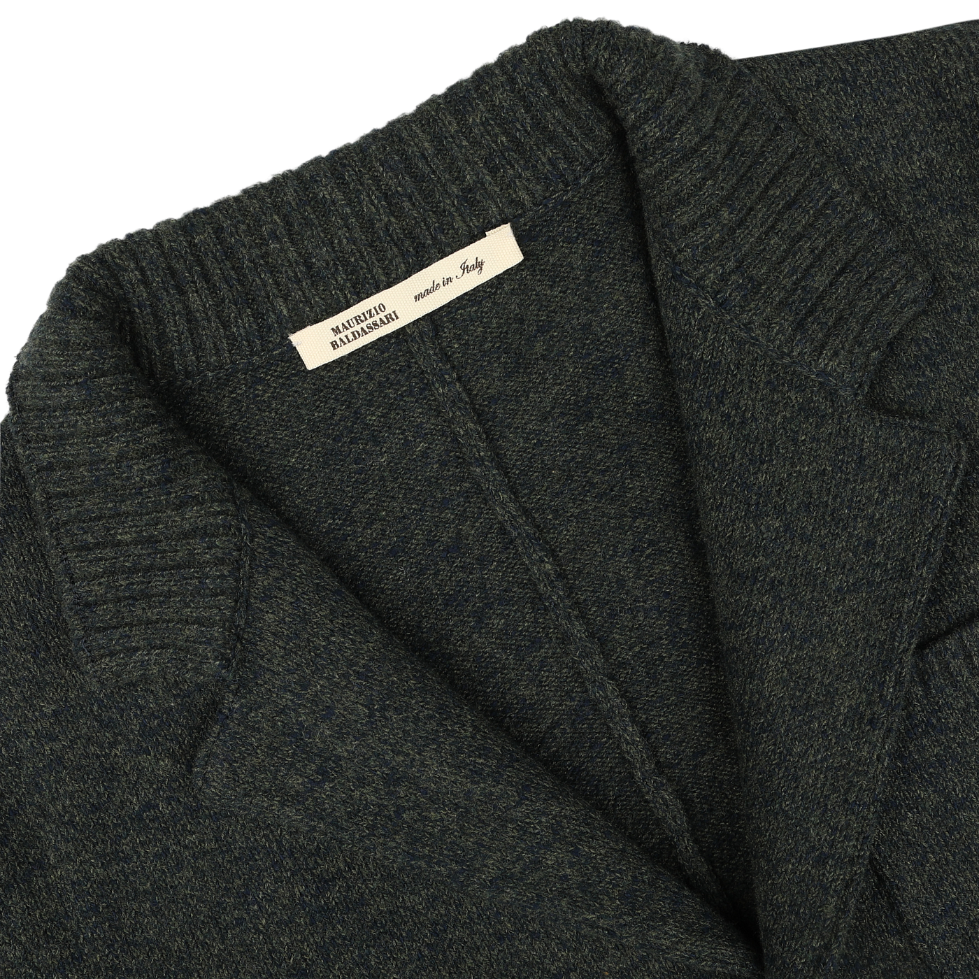 Close-up of a Maurizio Baldassari Green Melange Winter Wool Mouline Swacket's collar and lapel, with a visible label that reads "Made in Italy," highlighting its luxurious wool-cotton blend.