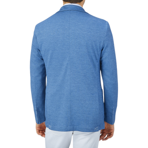 The back view of a man wearing a Maurizio Baldassari Light Blue Wool Linen Silk Jersey Blazer.