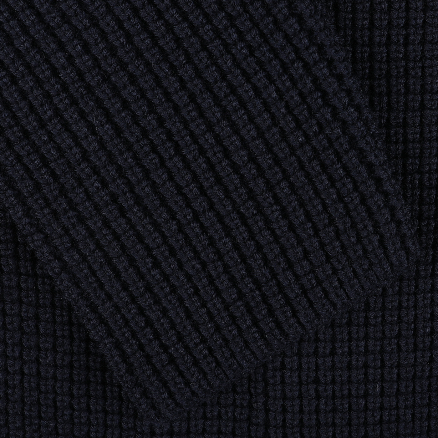 Close-up image of the Navy Blue Zegna Baruffa Wool Brenta Jacket from Maurizio Baldassari, featuring a thick knit fabric with a ribbed texture that showcases exceptional craftsmanship echoing Italian tradition.