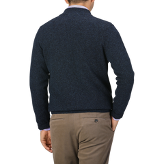 A person shown from the back wearing a Maurizio Baldassari Navy Winter Wool Mouline 1/4 Zip Sweater and tan trousers against a neutral background.