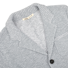 A sky blue knit cardigan with a collar and front button, crafted from a luxe cotton-viscose blend by Maurizio Baldassari.