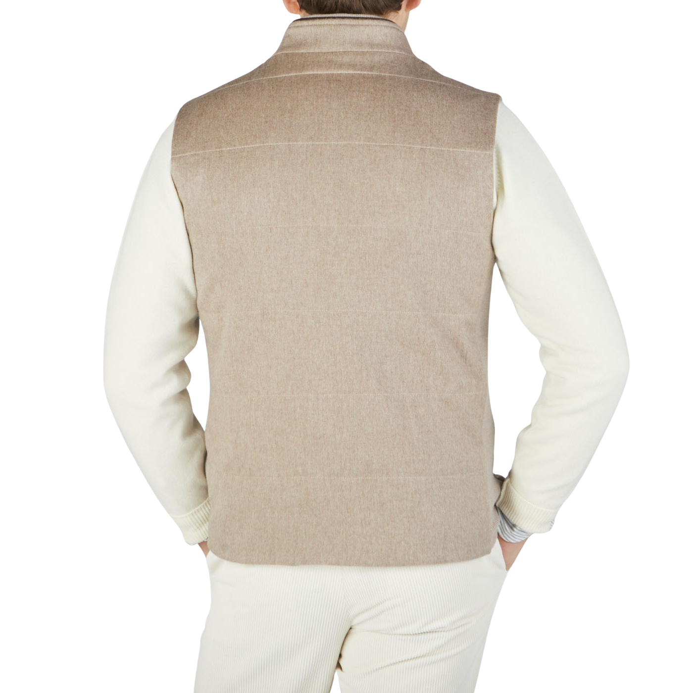The back view of a man wearing a Maurizio Baldassari Beige Water Repellent Pure Cashmere Gilet in oatmeal beige.