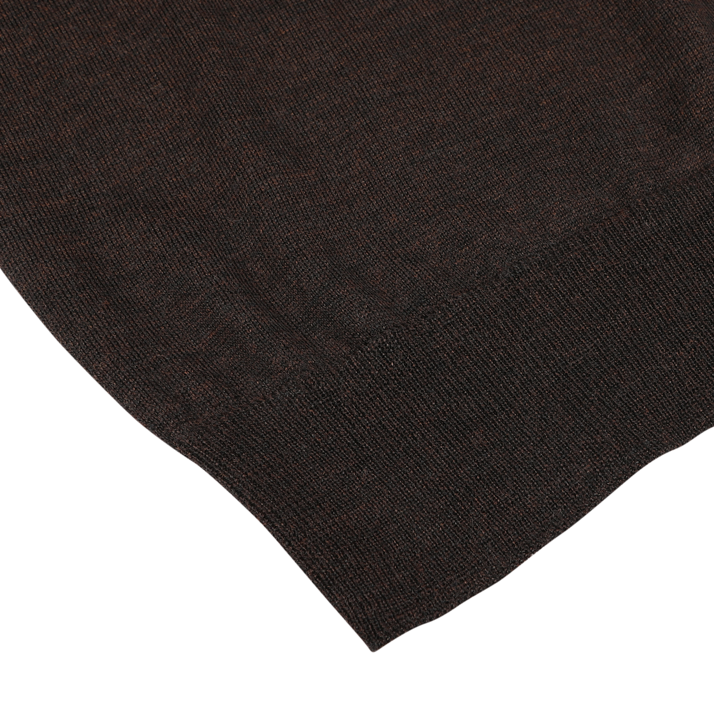 Close-up view of the hem of a dark brown, pure merino wool garment from Mauro Ottaviani’s Brown Melange 16 Gauge Merino Wool Polo Shirt against a white background.