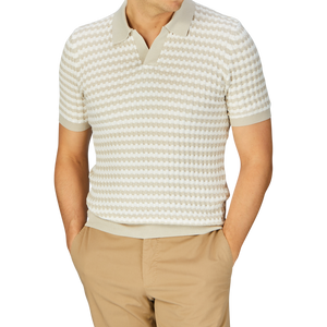Man wearing a Mauro Ottaviani Cream Beige Cotton Rib-Knitted Polo Shirt with khaki pants.