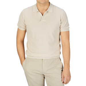 A man in a Mauro Ottaviani Cream Beige Cotton Silk Polo Shirt.