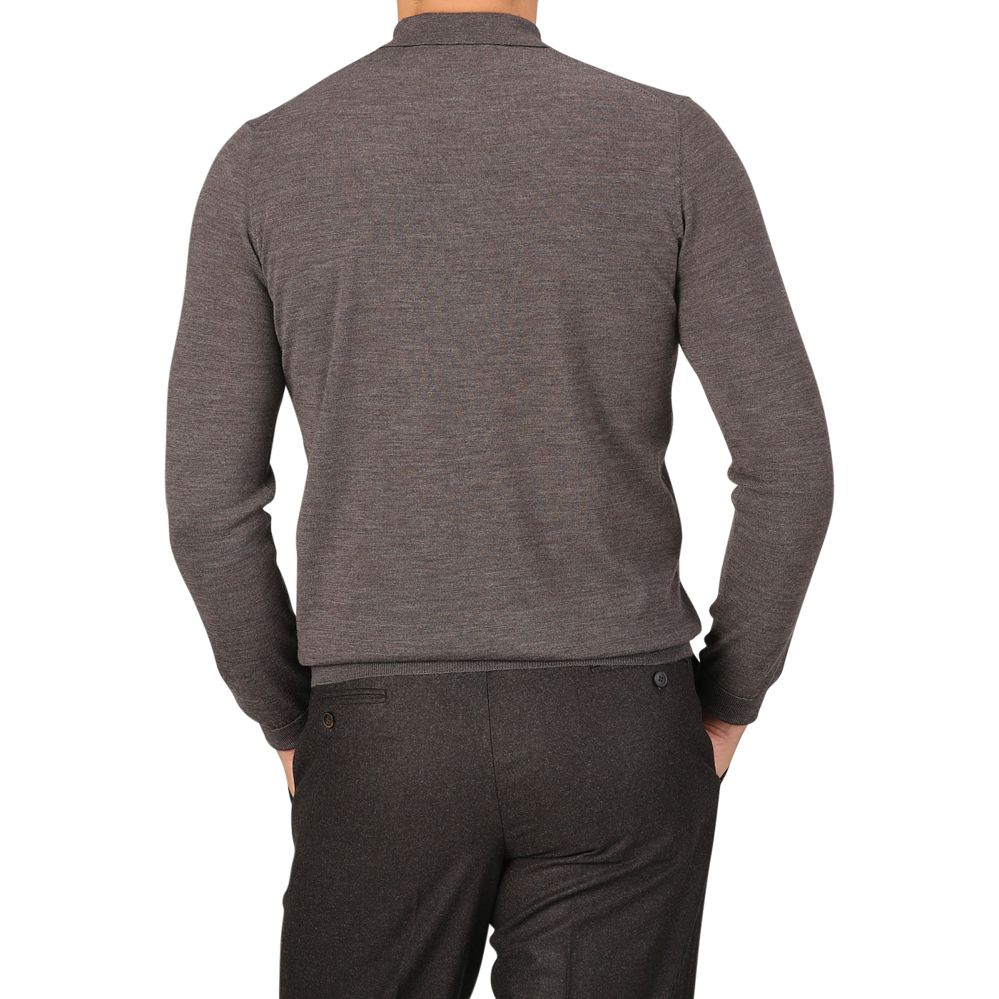 Rear view of a person wearing a long-sleeve, light brown 16 gauge Merino wool polo shirt by Mauro Ottaviani and dark gray trousers in a contemporary fit. The person is standing against a plain, light gray background.